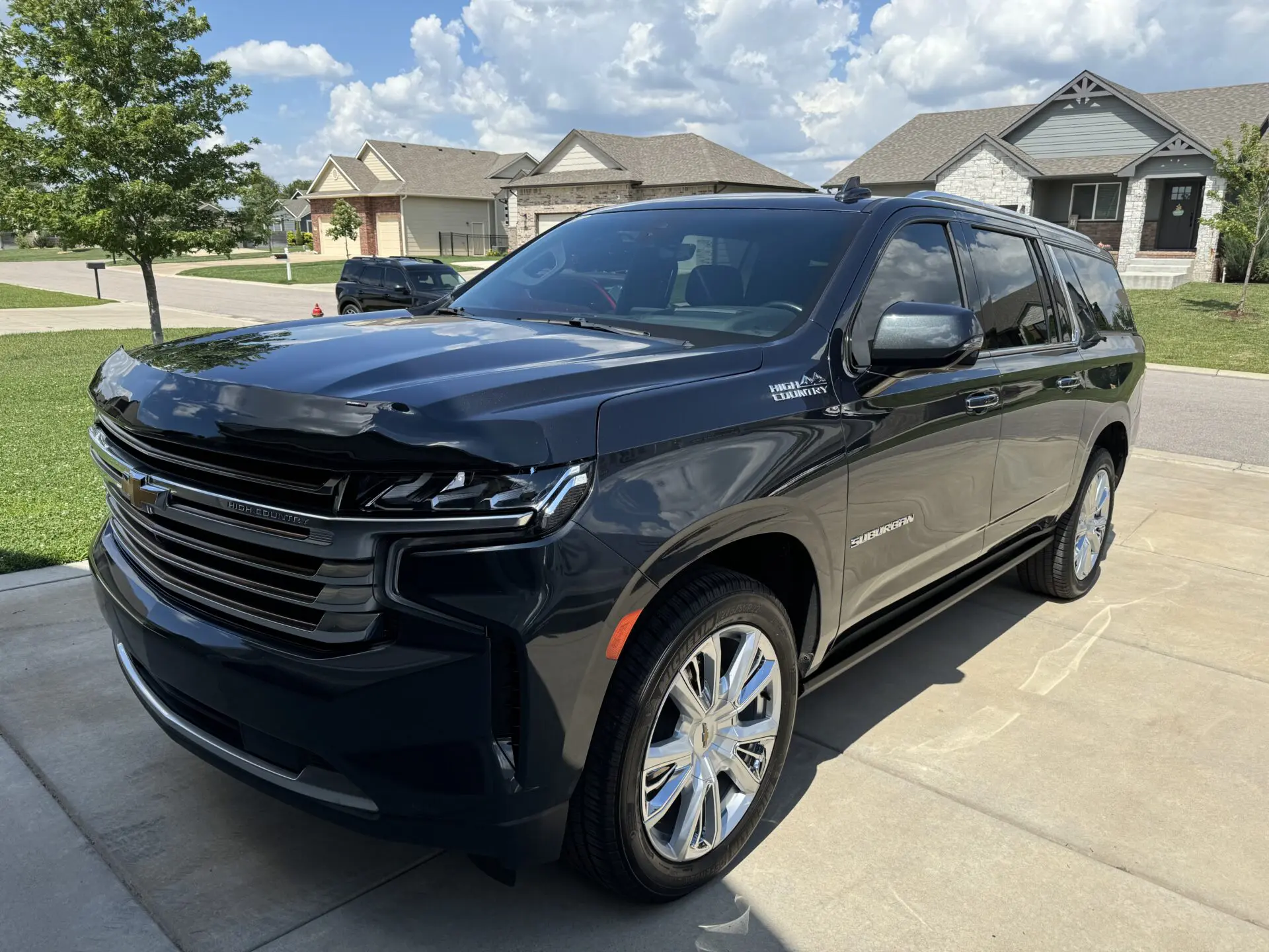 Glossy black Chevrolet Suburban after ceramic coating in Wichita, KS