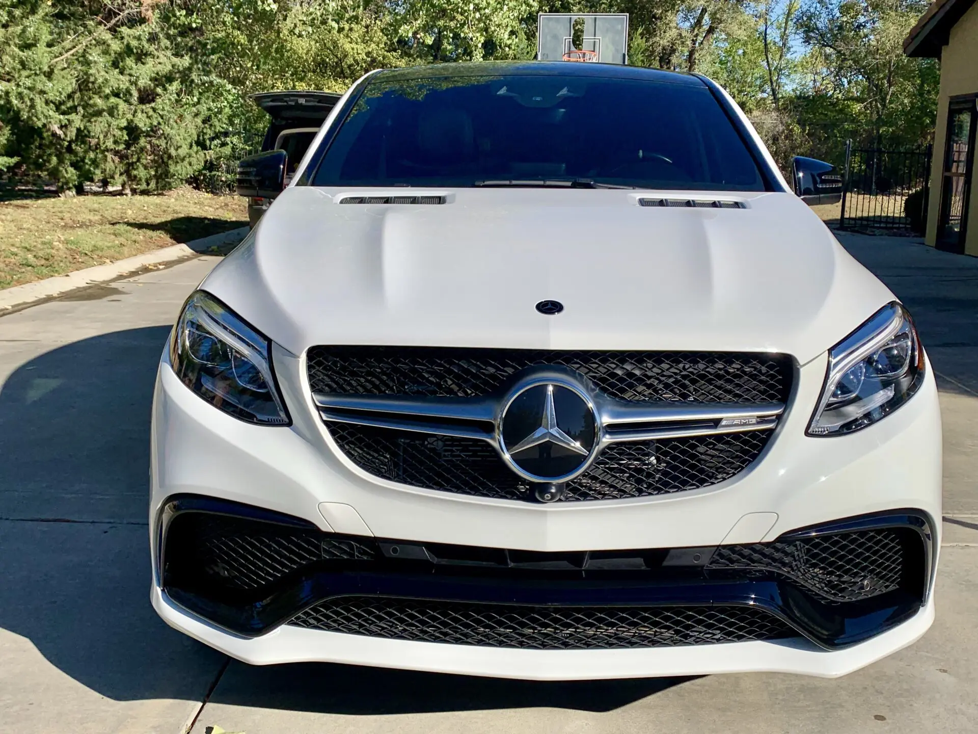 Clean white Mercedes-AMG SUV after professional detailing